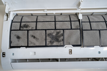 Dirty air conditioner filter in dust, untimely cleaning, maintaining and service of appliance....