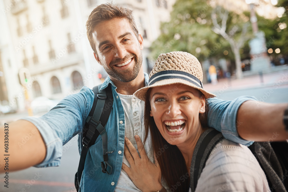 Sticker Happy couple, tourist and selfie in a city for travel on street with holiday memory and happiness. Portrait of man and woman outdoor on urban road for adventure, social media or vacation photo