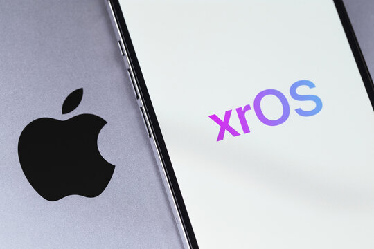 Apple xrOS logo on a screen smartphone, iPhone. Apple has officially launched the xrOS brand, intended for an AR headset, VR helmet or MR headset. Batumi, Georgia - May 16, 2023