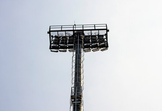 stadium spotlight, lamppost, power industry, stadium or sports lighting against the sky.