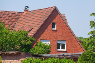 Fototapeta na wymiar Wohngebäude aus Backstein, Damme, Niedersachsen, Deutschland