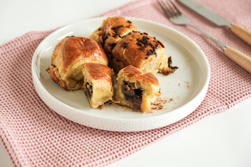 pisang bolen is made from bananas covered in rolled sheet of pastry dough filled chocolate and cheese
