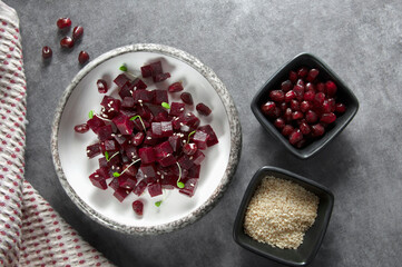 Fresh beetroot salad diced with pomegranate seeds, sesame seeds and herbs.