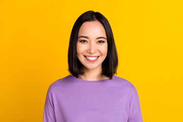 Photo of adorable good mood girl with bob hairdo dressed violet shirt smiling at camera dental ad...