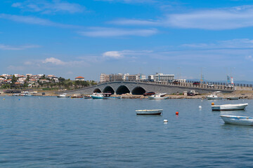Balikesir, Turkey - April 30 2023: Cunda Island with boats during day with Cunda Bridge