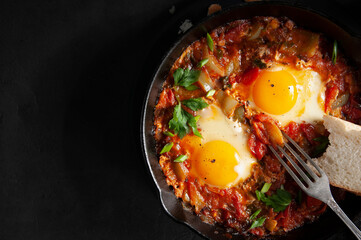 Eggs Poached in Spicy Tomato Pepper Sauce