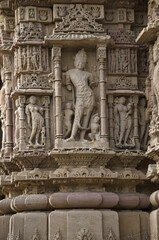 Carving details on the outer wall of the Sun Temple. Built in 1026 - 27 AD during the reign of Bhima I of the Chaulukya dynasty, Modhera village of Mehsana district, Gujarat, India