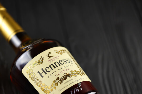 KYIV, UKRAINE - MAY 4, 2022 Hennessy Very Special original alcohol bottle on black wooden table. Elite alcohol production