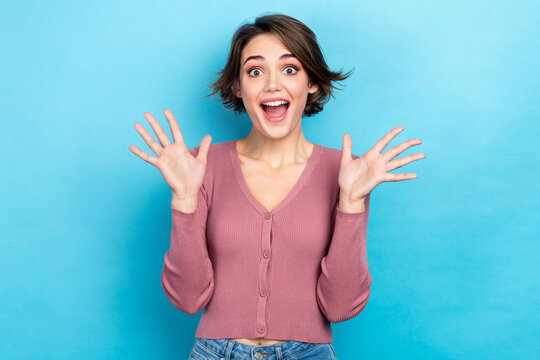 Photo of nice astonished lady open mouth raise opened arms palms isolated on blue color background