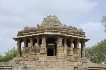 Fototapeta na wymiar Outer view of the Sun Temple. Built in 1026 - 27 AD during the reign of Bhima I of the Chaulukya dynasty, Modhera village of Mehsana district, Gujarat, India