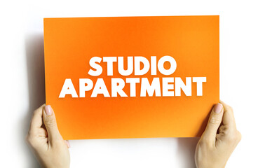 Studio Apartment in which the normal functions of a number of rooms often are combined into a single room, text concept on card
