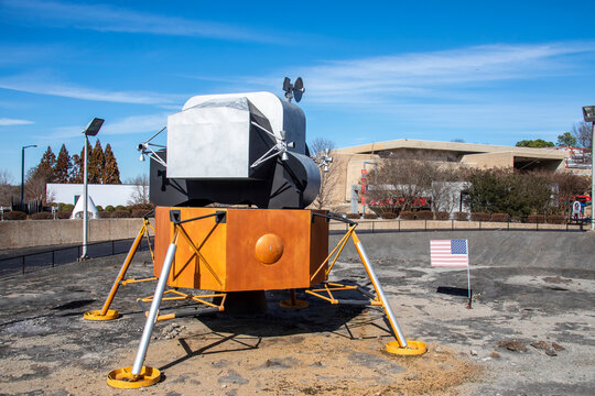 Huntsville USA 10th Feb 2023: the Apollo Lunar Excursion Module (LEM) with US flag in U.S. Space Rocket Center. was used like a camping tent for astronauts while they explored the surface of the moon.