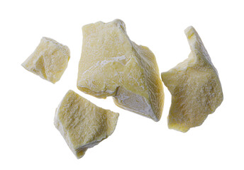 pieces of cocoa butter on a transparent background top view