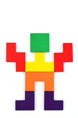 Man formed with colorful pieces of wood