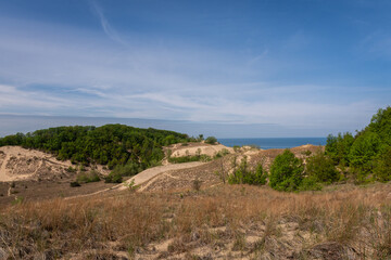 Sand dunes in the morning sun.  Warren Dunes state Park, Michigan, USA.