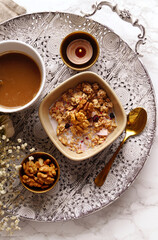Homemade granola with walnuts and coffee