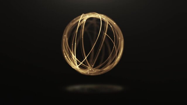golden lines with glitter forming a circle on a black background