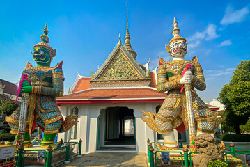 Fototapeta premium The visiting card of the capital of Thailand is the Buddhist temple Wat Arun, Temple of Dawn, which is located on the banks of the Chao Phraya River