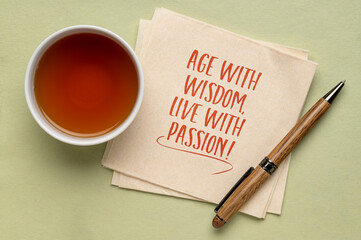 Age with wisdom, live with passion. Inspirational note on a napkin. Healthy aging and personal development concept.