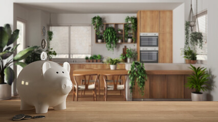 Wooden table top or shelf with white piggy bank with coins, sustainable kitchen and dining room, expensive home interior design, renovation restructuring concept architecture