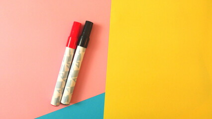 Color paper backgrounds with Red and White whiteboard pens