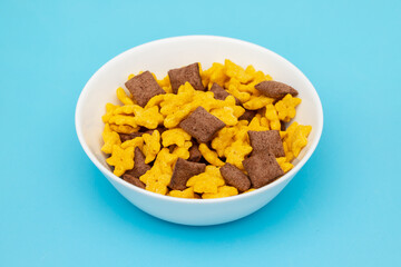 Corn and chocolate breakfast cereal in bowl