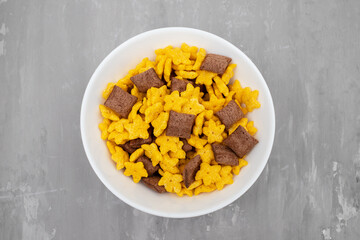 Corn and chocolate breakfast cereal in bowl