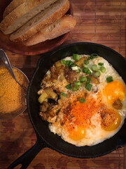 Indian fried eggs with potatoes and chutney powder