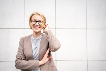 portrait of one caucasian mature woman female businesswoman outdoor