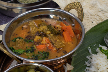 Indian bitter mellon and moringa drumsticks, carrot sambar- a lentil spicy stew served with rice