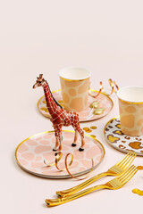 Safari animals birthday party decorations and props. Cute paper party plates and cups for themed kids party. Set of holiday disposable tableware for party or picnic.