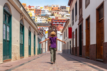 Fototapeta na wymiar Lifestyle, vacations walking through the city of San Sebastian de la Gomera next to the Iglesia De La Asuncion, Canary Islands