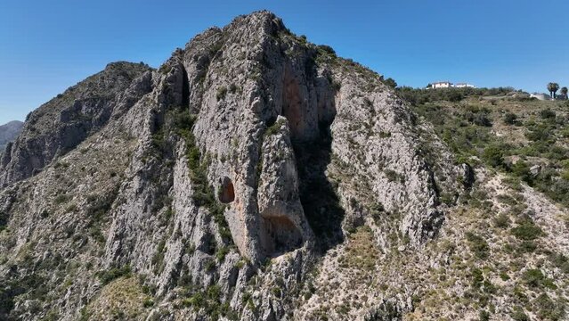 Hole in Countains of Cascada de Hort nearby T&agrave;rbena Spain