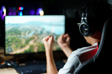 Close-up on the Hands of the Gamer Playing in the Video Game ,computer on a Keyboard ,joystick.