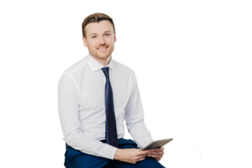 Indoor shot of male financier with positive expression wears formal white shirt with tie, holds modern tablet computer in hands, isolated over white background. People, work and technology concept