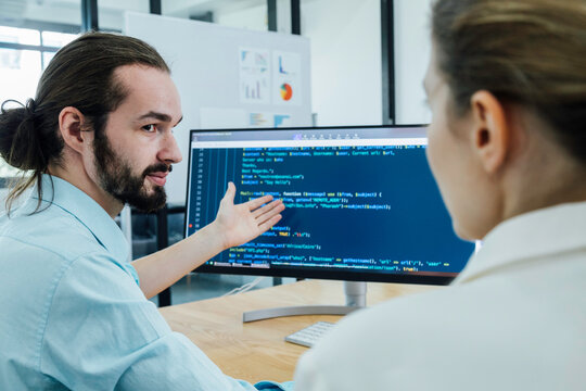 Professional development programers programming game software or developing code for shopping online financial data security system network working at home. It technology.