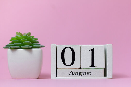 August 1 in the calendar on a pink background is the start date of a new month.
