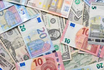 Money background. Euro and dollar banknotes background.