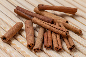 cinnamon sticks on a bamboo tray 