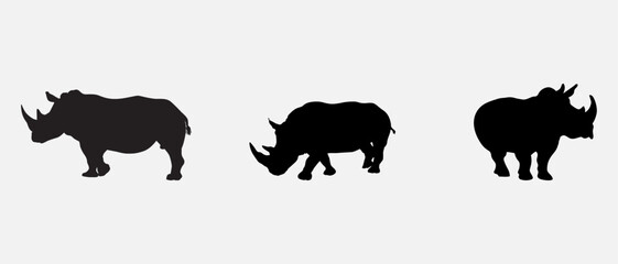 isolated black silhouette of a rhinoceros , vector collection
