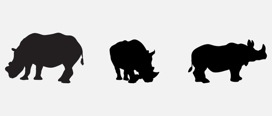 isolated black silhouette of a rhinoceros , vector collection