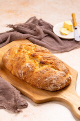 Rustic Perfection: Artisanal Italian Bread With Butter, Baked to Crusty Golden-Brown Perfection, a Staple of Italian Cuisine for Sandwiches, Bruschetta