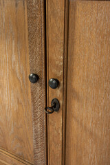 Painted wooden cabinet doors with metal handles