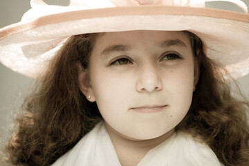 Cute girl in a fancy hat