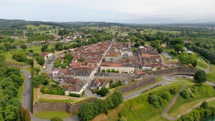 Aerial view of the city of Navarrenx from above the gave of Oloron