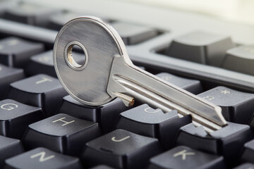 phishing, hacking personal data and money , key and hook on computer keyboard.