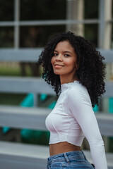 beautiful woman with dark and curly skin