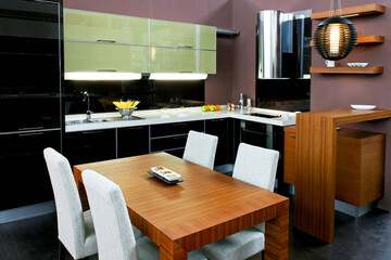 Contemporary kitchen with brown dinning table and chairs