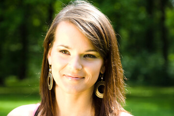 Naklejka premium Young Woman Walking In The Park