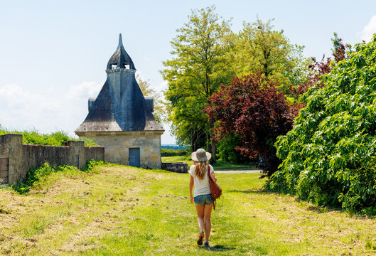 Woman walking in Blaye citadel- Tour tourism in France,  Nouvelle aquitaine, Gironde